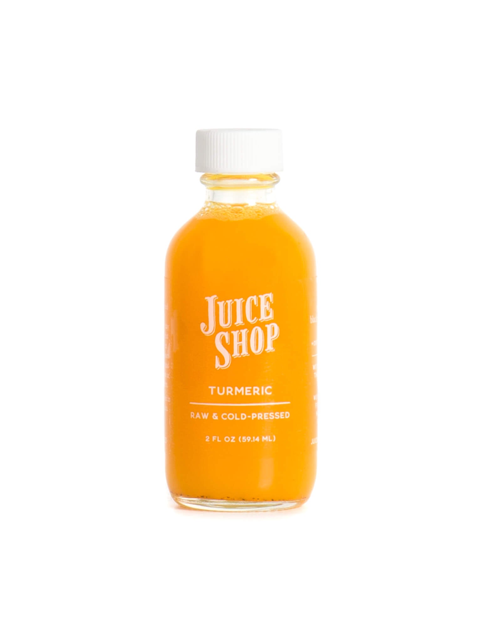 Juice Shop turmeric raw cold-pressed elixir in a 2 oz glass bottle with a white cap.