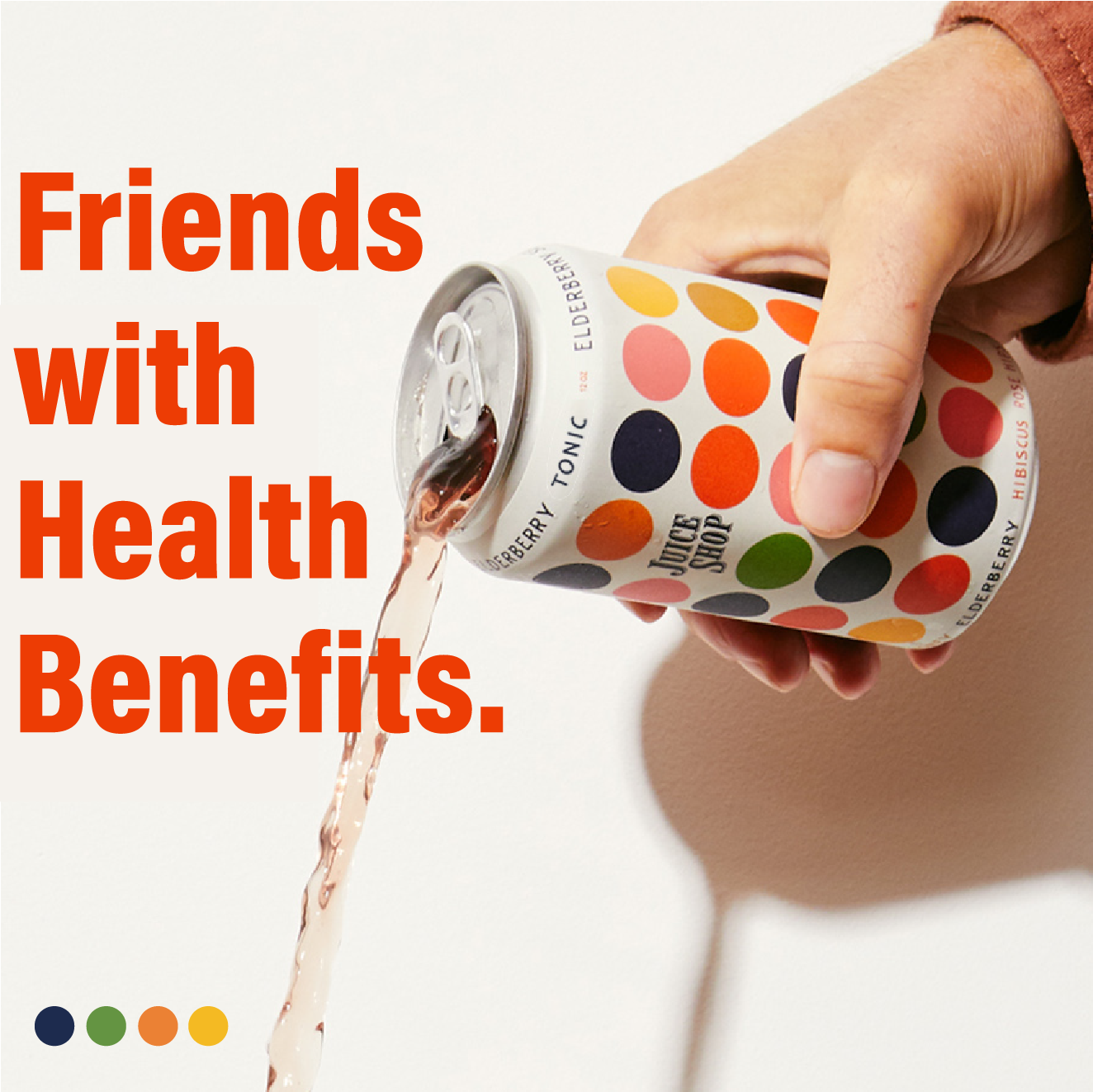 Hand pours Juice Shop Elderberry Tonic, vibrant can design visible.