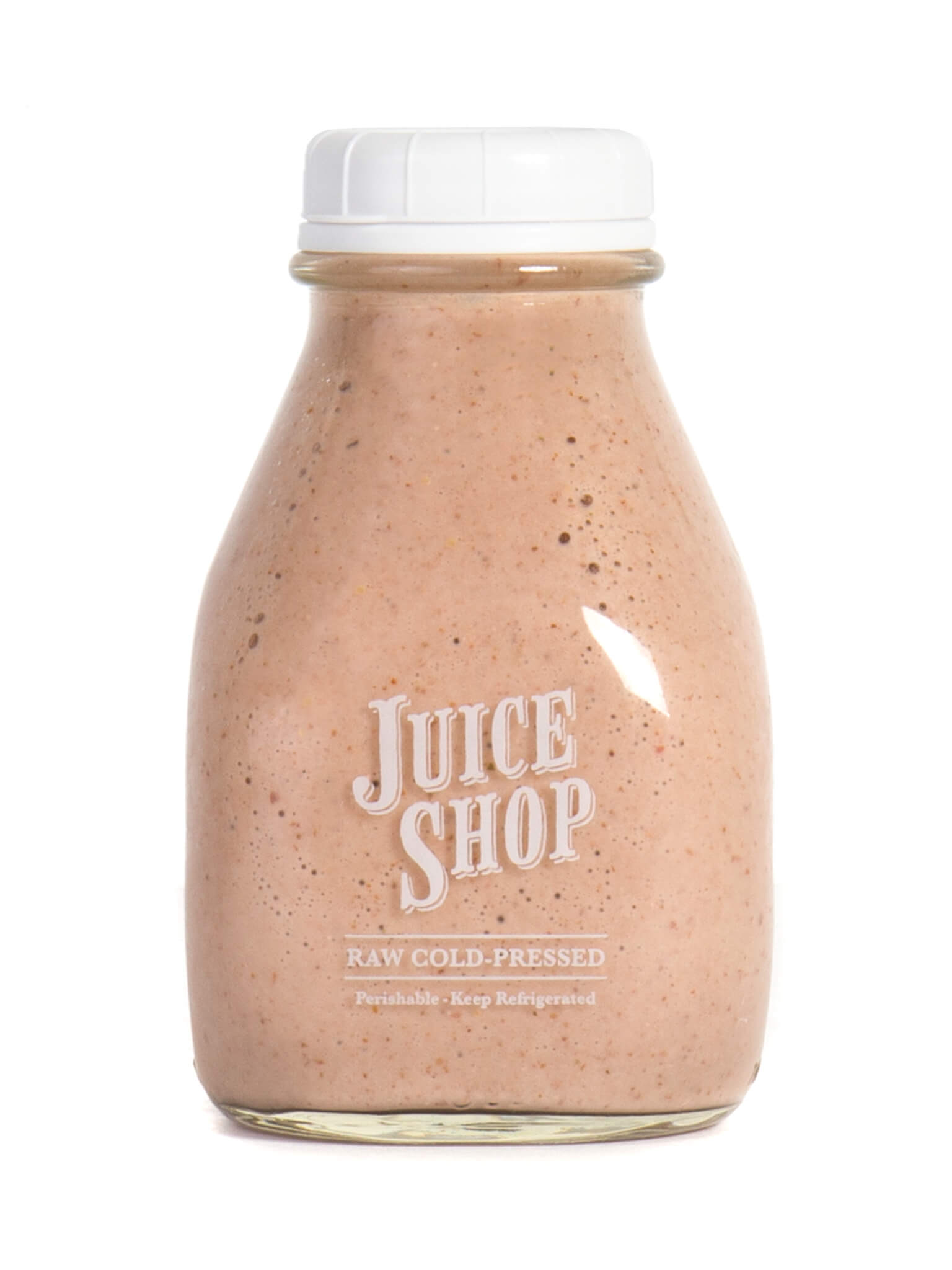 Juice Shop raw cold-pressed smoothie in a speckled beige glass bottle with a white cap.