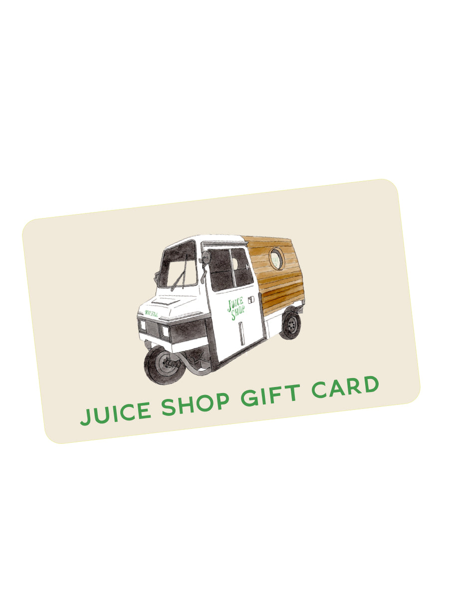 The gift card displays an illustration of a small three-wheeled delivery vehicle with Juice Shop on its side. Set against a beige backdrop, it reads Online Juice Shop Gift Card, ideal for online orders or in-store purchases.